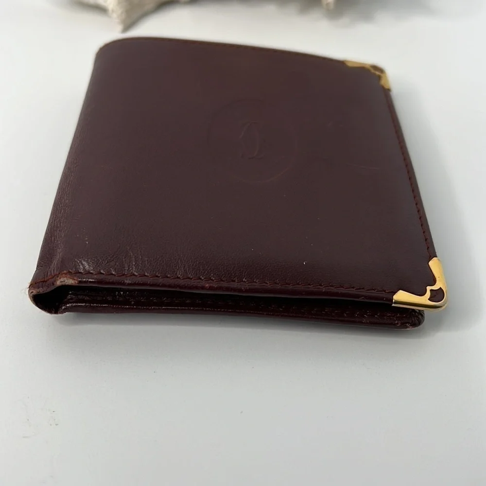 Burgundy calfskin coin/banknote/credit card wallet - unisex